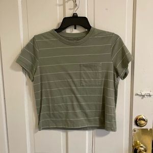 Green and white striped top with pocket